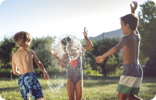 Kids playing with water balloons