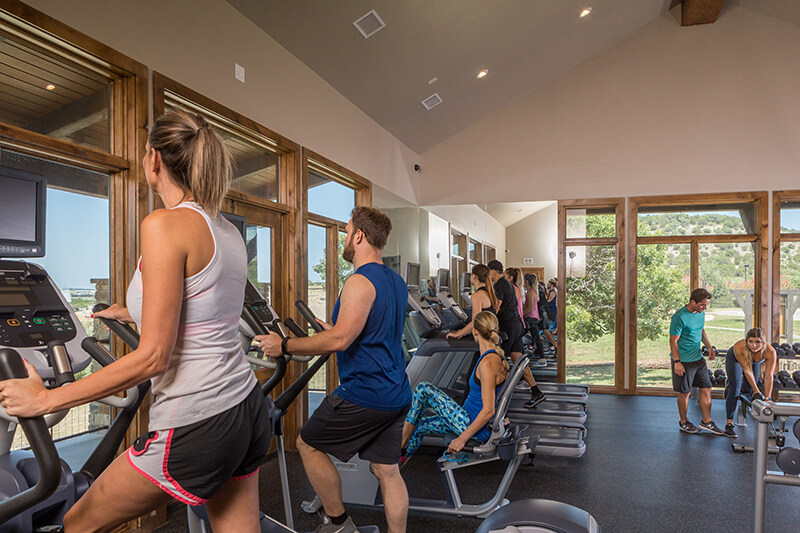 People using elliptical machines at Sweetwater Fitness Center