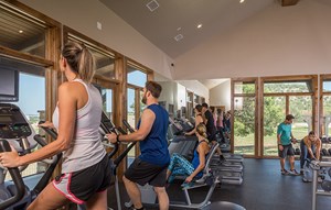 People using elliptical machines at Sweetwater Fitness Center